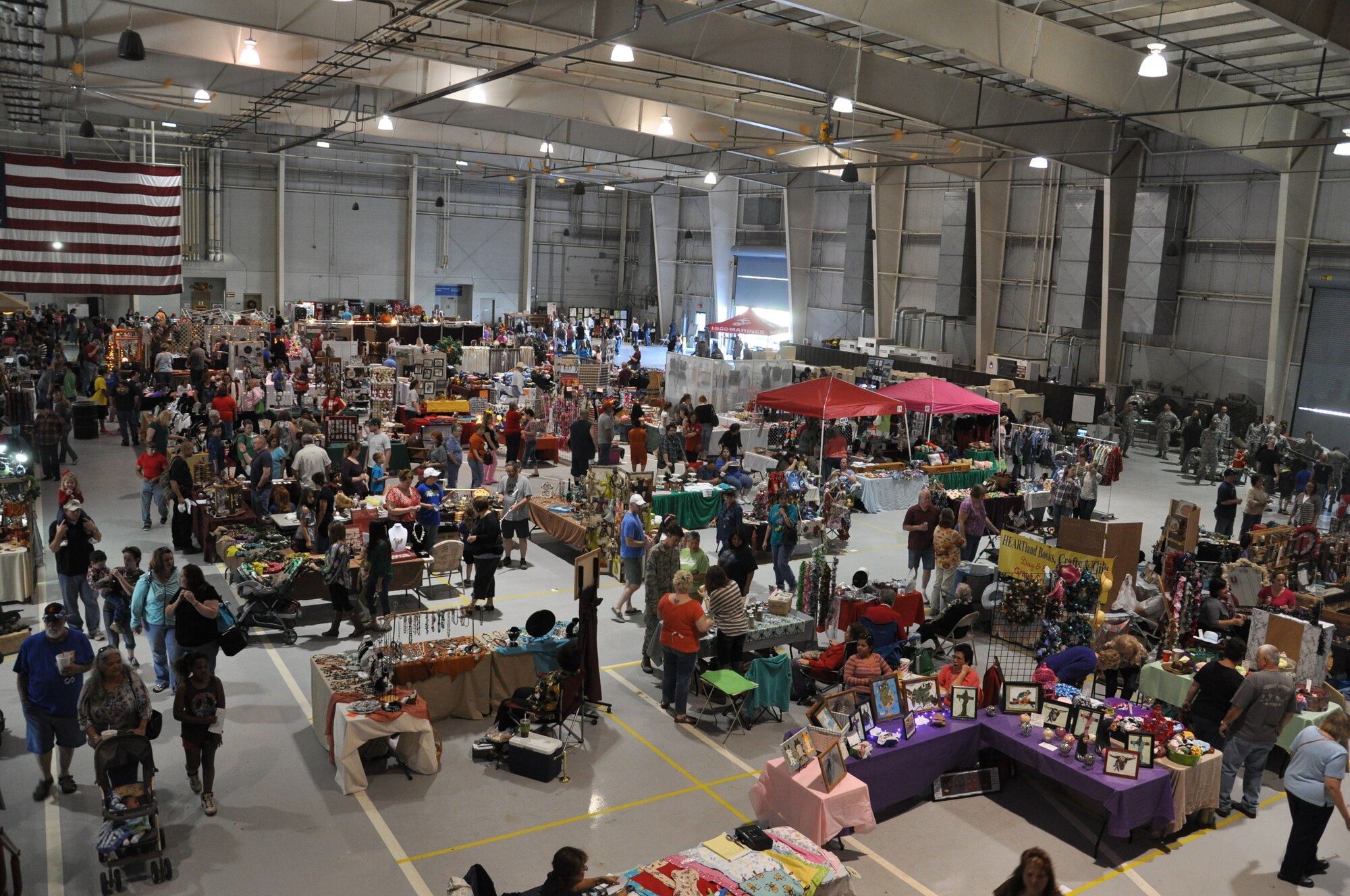 GOODFELLOW AIR FORCE BASE, Texas-  Members from the San Angelo community and Goodfellow shop during the 5th Annual Goodfellow Community Appreciation Day at the Louis F. Garland Department of Defense Fire Academy Nov. 18. The event featured a drill competition, demonstrations and more than 100 vendors from the local community for members of the community and base to enjoy. (U.S. Air Force photo/ Airman 1st Class Erica Rodriguez)