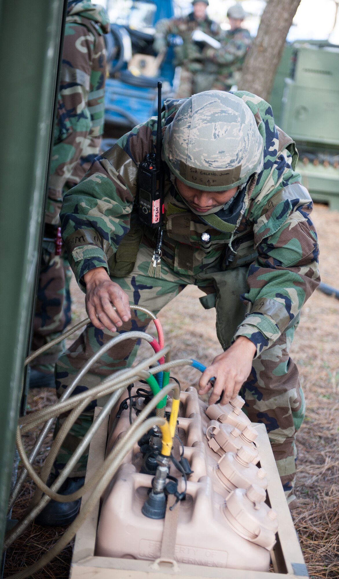 Senior Airman Jason Galang, 8th Civil Engineer Squadron water fuel systems maintenance technician, inspects a filtration system during Beverly Bulldog 14-01 at Kunsan Air Base, Republic of Korea, Nov. 19, 2013. Airmen from the 8th CES tested their ability to provide clean and potable water to the Wolf Pack. The 8th Fighter Wing is testing its wartime mission alongside other 7th Air Force units and supporting organizations with an emphasis on the operational and tactical levels of war during the peninsula-wide exercise. (U.S. Air Force photo by Senior Airman Armando A. Schwier-Morales)