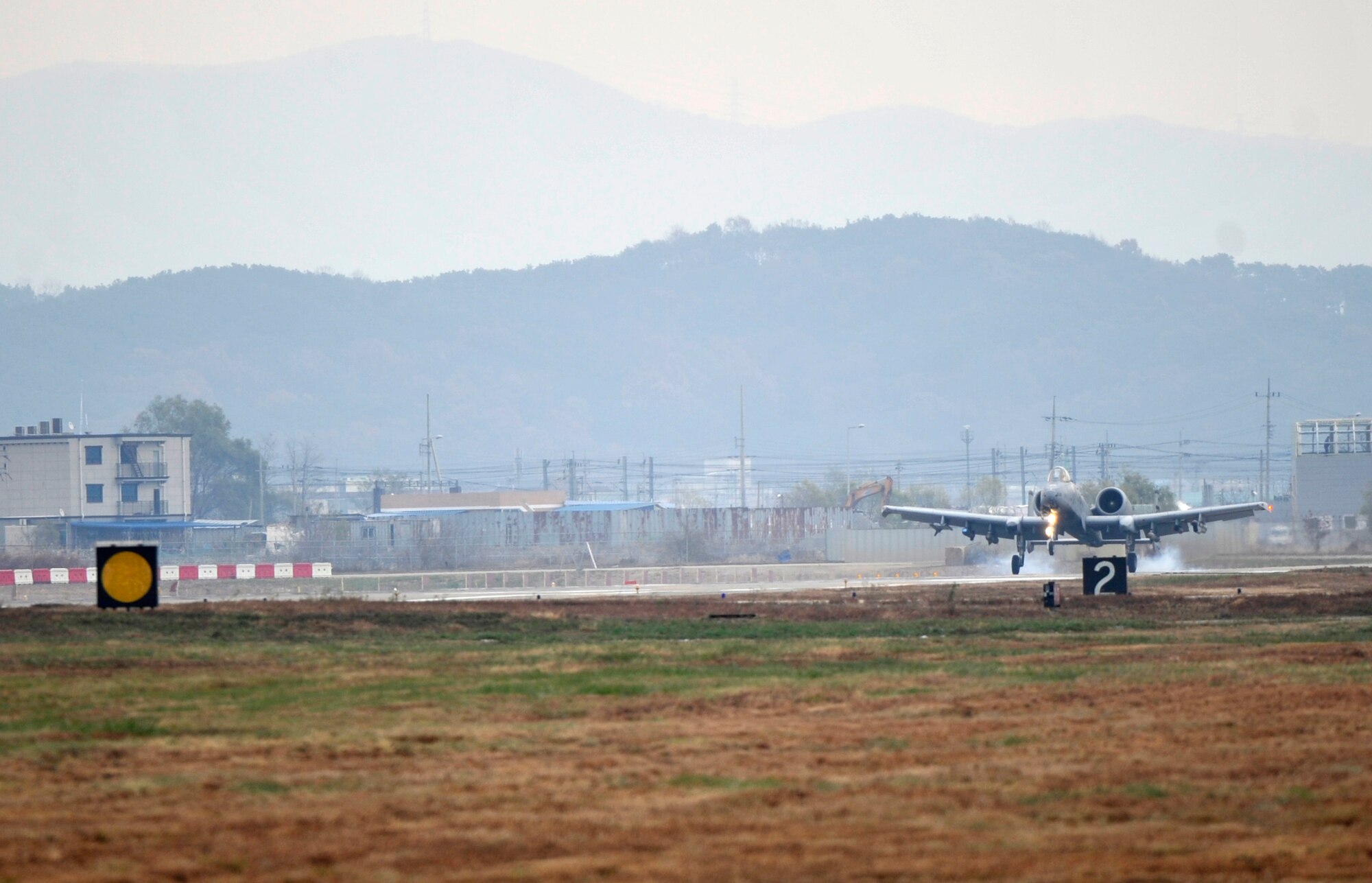 An A-10 Thunderbolt from the 25th Fighter Squadron lands at the end of the first combat sortie of Operational Readiness Exercise Beverly Bulldog 14-01 at Osan Air Base, Republic of Korea, Nov. 19, 2013. The week-long exercise tests Airmen’s abilities during a heightened state of readiness while providing combat ready forces for close air support, air strike control, forward air control-airborne, combat search and rescue, counter air and fire, and interdiction in the defense of the ROK. (U.S. Air Force photo/Staff Sgt. Emerson Nuñez)
