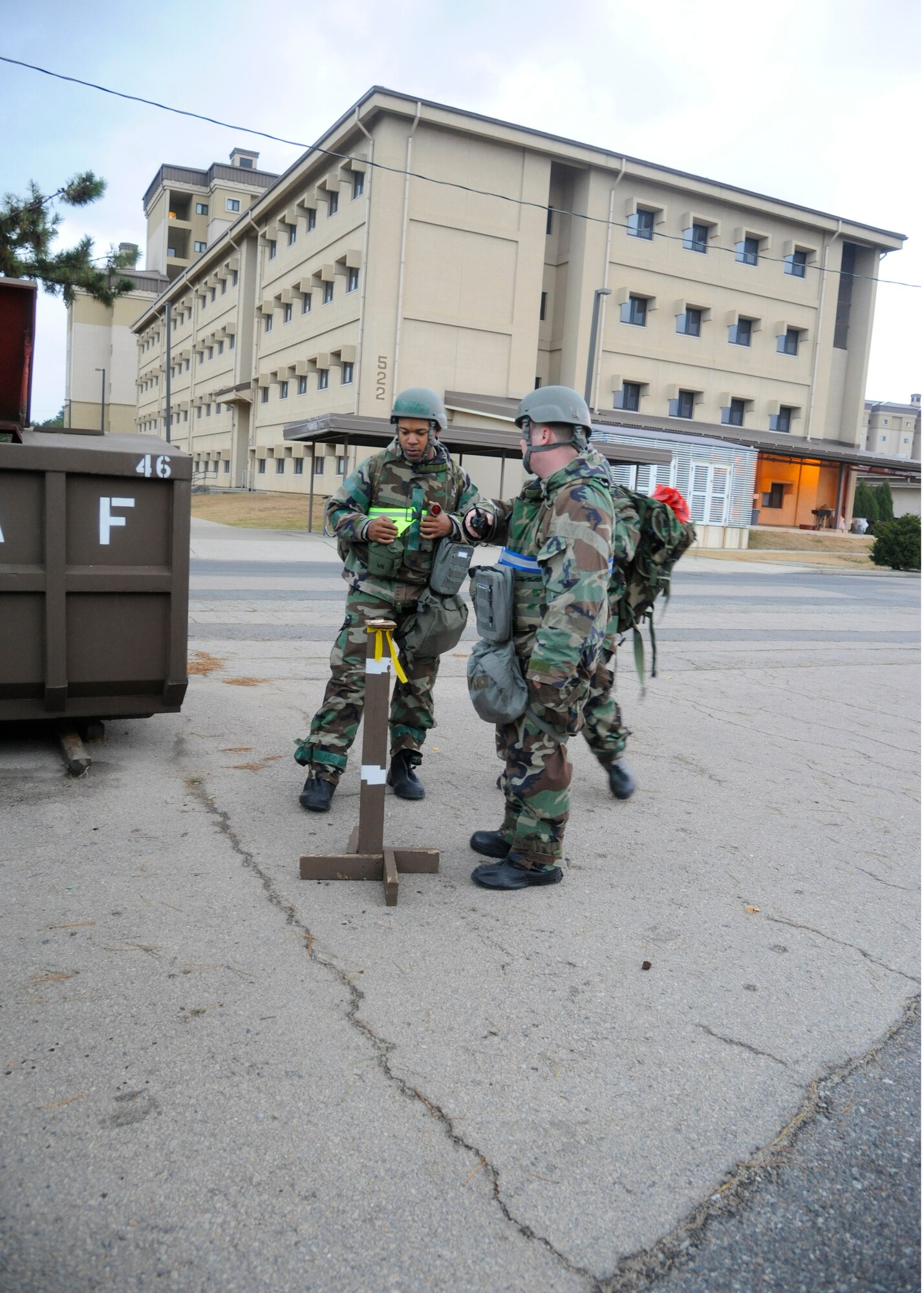 Tech. Sgt. Samuel Eller, 8th Comptroller Squadron, and Staff Sgt. Doron Smith, 8th CPTS, conduct par sweeps in their area of responsibility during Exercise Beverly Bulldog 14-01 at Kunsan Air Base, Republic of Korea, Nov. 19, 2013.  Exercise Beverly Bulldog 14-01 demonstrates and enhances the readiness of 7th Air Force to defend and sustain the capabilities which strengthen the ROK-U.S. Alliance. (U.S. Air Force photo by Staff Sgt. Jessica Haas/Released)