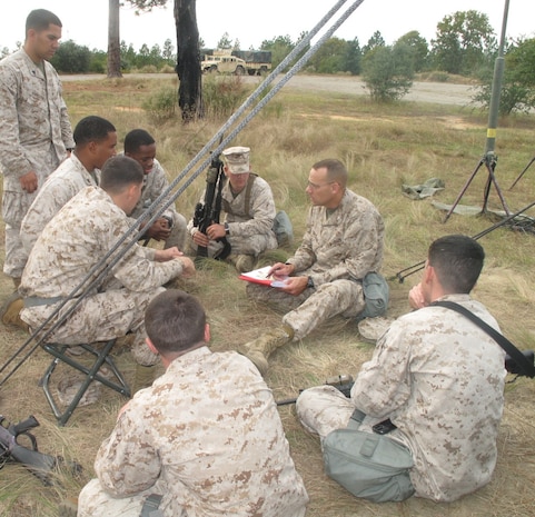 Colonel Ryan P. Heritage speaks to Marines from 6th Marine Regiment, 2nd Marine Division during Rolling Thunder training exercise.