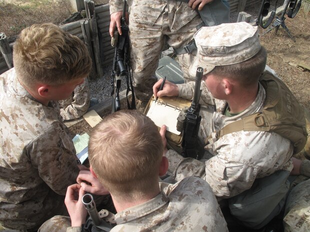 Marines from 6th Marine Regiment, 2nd Marine Division discuss operations of their Rolling Thunder Exercise