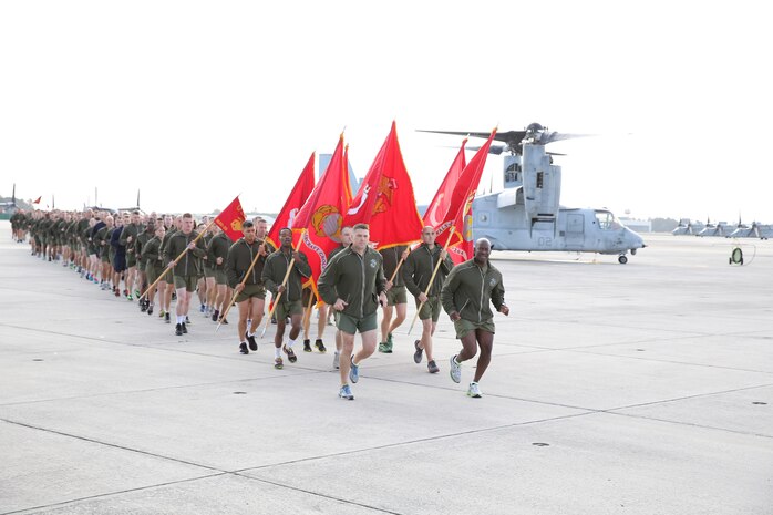Col. John C. Vara, Marine Aircraft Group (MAG) 26 commanding officer, and Sgt. Maj. Christopher K. Edmondson, MAG-26 sergeant major, lead their Marines during their Marine Corps birthday run, Nov. 6. MAG-26 celebrated the Marine Corps’ 238th birthday with a three-mile run and cake-cutting ceremony on the flight line aboard Marine Corps Air Station (MCAS) New River. 