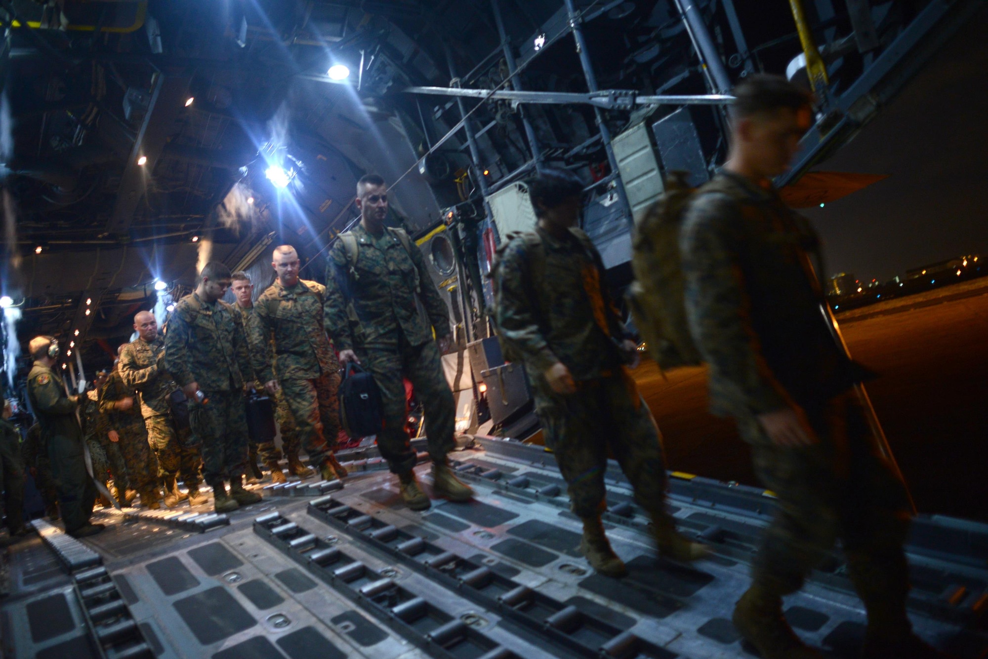 An Air Force C-130 Hercules aircraft delivers Marines to support Operation Damayan Nov. 18, 2013, at Villamor Airfield, Republic of the Philippines. 