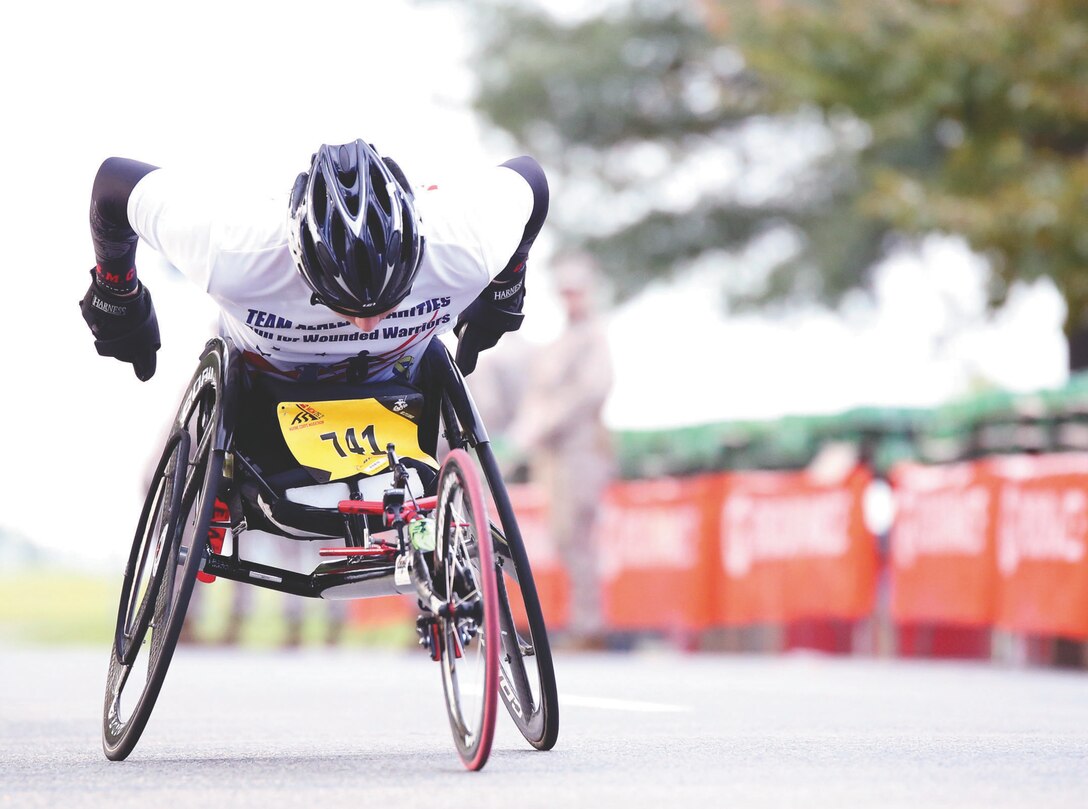 The rehabilitation phase is when wounded, ill or injured Marines begin to get their lives back, leaving the hospital to compete in sporting events and other outings at the same time that they plan their careers and their families’ lives begin to return to normal. Here, a wounded warrior competes by handcycle in the 2013 Marine Corps Marathon.  