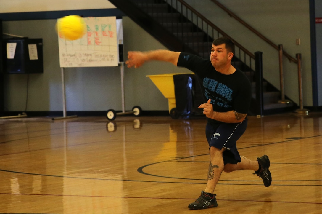 Kyle Smith launches a dodgeball at the opposing team during Headquarters and Support Battalion’s Commander’s Cup Challenge aboard Camp Lejeune, Nov. 14.