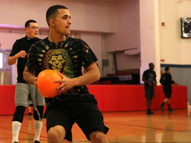 Edwin Perez prepares to launch a dodgeball at the opposing team during HQSPTBn’s Commander’s Cup Challenge aboard Camp Lejeune, Nov. 14.