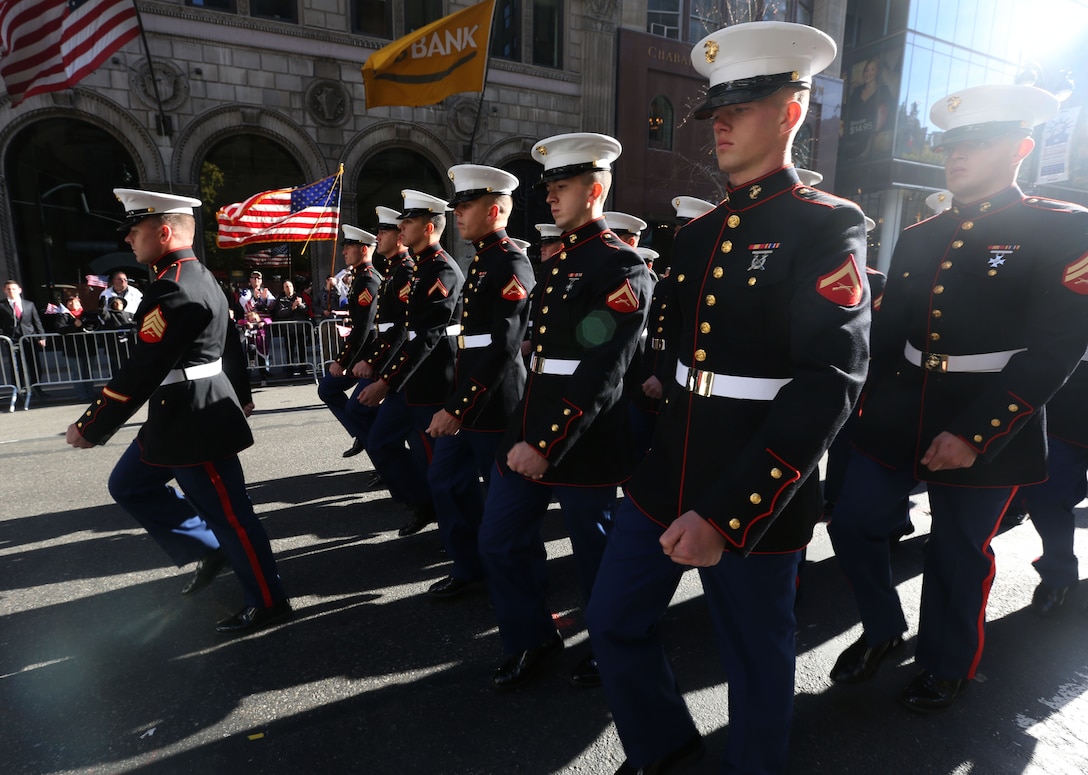 Marines with 3rd Battalion, 6th Marine Regiment, 2nd Marine Division and 2nd Marine Aircraft Wing march in the Veterans Day parade Nov. 11, 2013 as part of New York City’s holiday festivities. The parade went right through Manhattan, with thousands lining the sides of the streets yelling, chanting and cheering on the service members as they marched by.