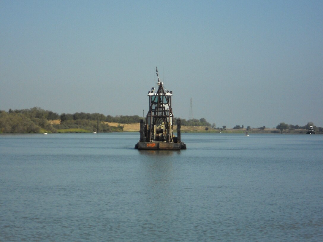 A dredge contracted by the U.S. Army Corps of Engineers Sacramento District is shown near the upper San Joaquin River about 40 miles northeast of San Francisco Sept. 17, 2013. The district performs yearly dredging in the Sacramento River Deep Water Ship Channel and the Stockton Deep Water Ship Channel to maintain authorized depths. 
