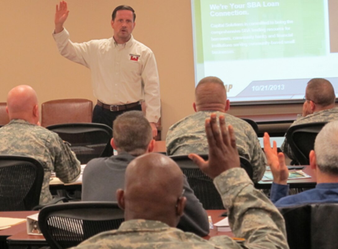Huntsville Center employee Russ Dunford gives service members and their families a briefing on financial readiness during the Transition Assistance Program workshop held Nov. 18-22 on Redstone Arsenal. 