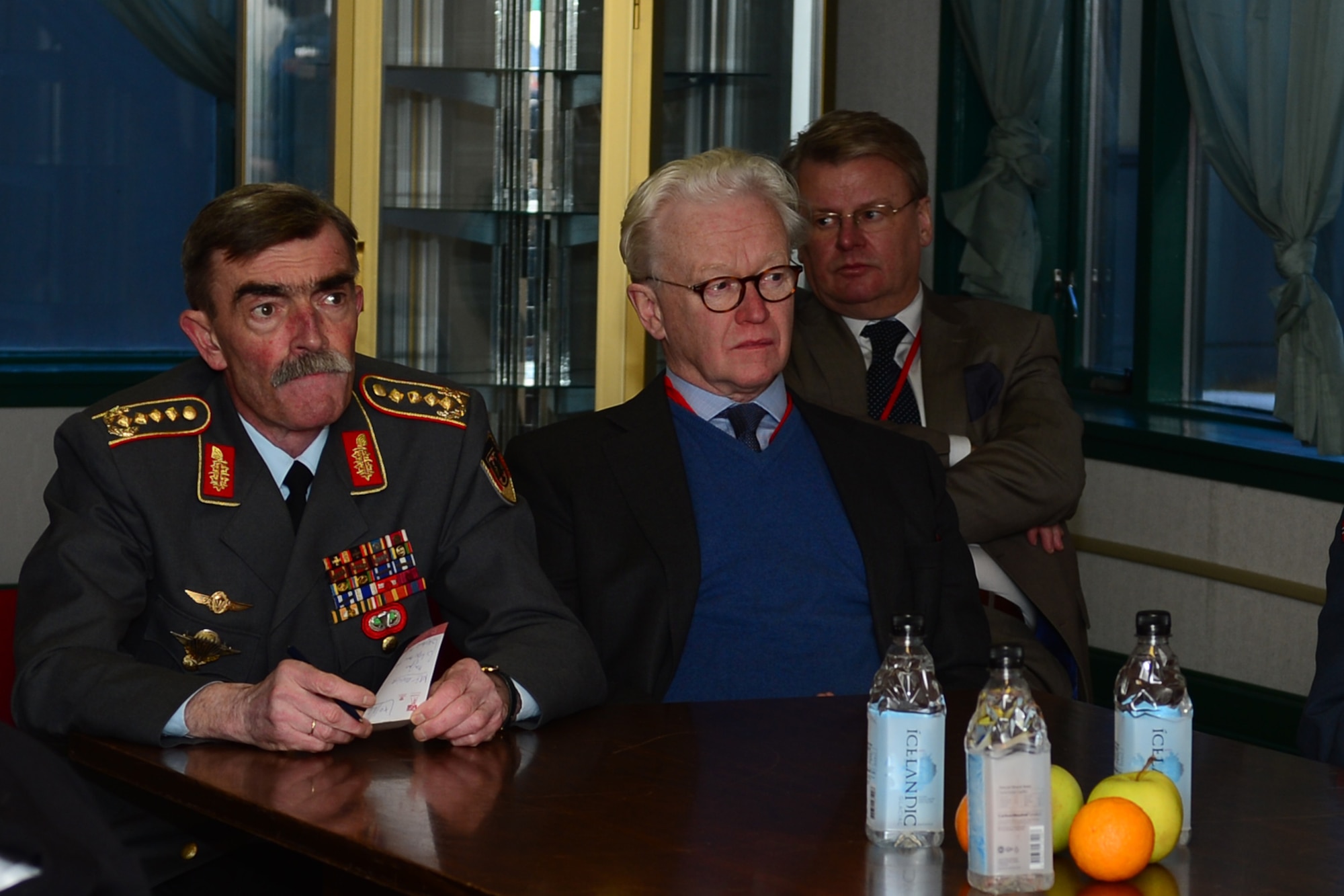 General Hans-Lothar Domröse, Commander Joint Force Command Brunssum German Army, receives a United States Air Force mission brief during a tour at Keflavik International Airport, Iceland, Nov. 19, 2013. The 48th Air Expeditionary Group conducts tours to highlight and further explain why the U.S. Air Force supports air policing and surveillance missions while deployed to Iceland. (U.S. Air Force photo by Airman 1st Class Dana J. Butler/Released)