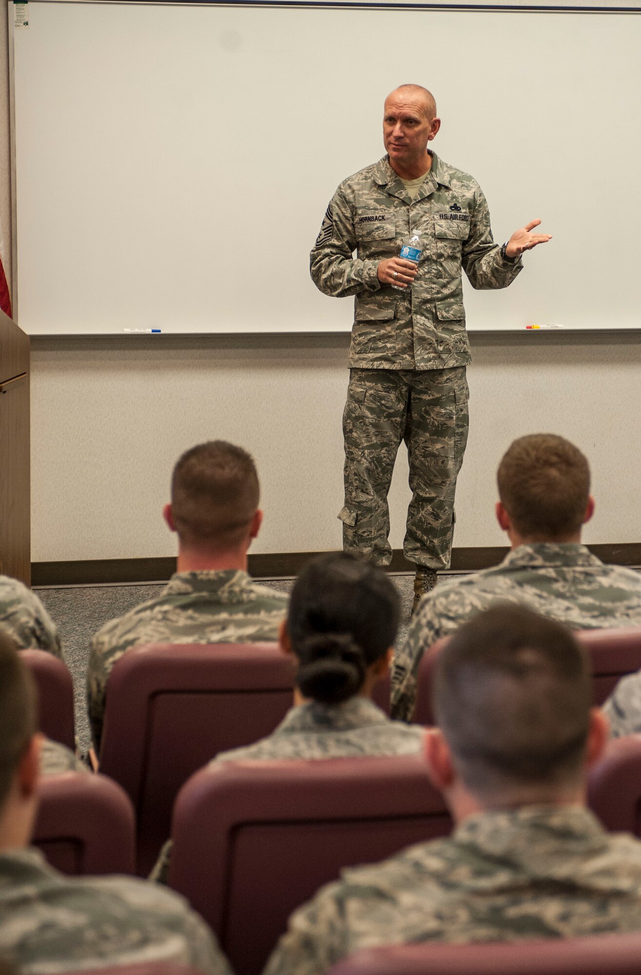 Chief Master Sgt. Brian Hornback, command chief for Air Force Global Strike Command, speaks to Airmen Leadership School students at Minot Air Force Base, N.D., Nov. 19. Hornback discussed the importance of being open to new opportunities and growth in an individual’s career. (U.S. Air Force photo/Senior Airman Stephanie Sauberan)