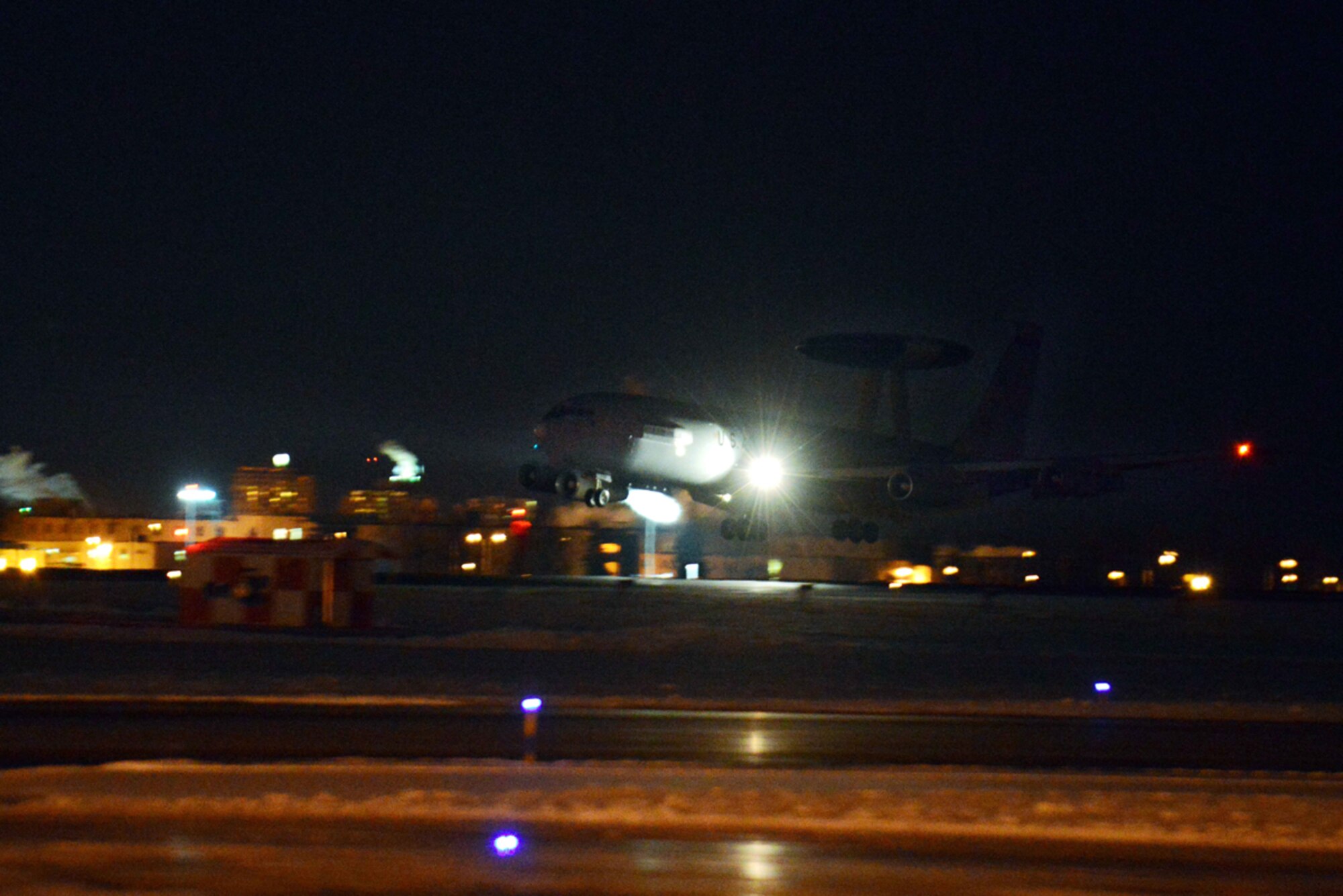 An E-3 Sentry from the 962nd Airborne Air Control Squadron performs a touch and go landings on Joint Base Elmendorf-Richardson, Alaska, Nov. 17, 2013. The Sentry is an airborne warning and control system aircraft that provides all-weather surveillance, command, control and communications. (U.S. Air Force photo/Staff Sgt. Sheila deVera)