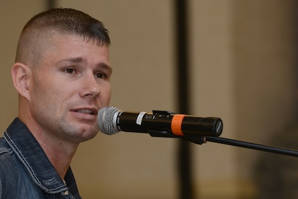 America's Got Talent contestant Jimmy Rose performs after taking pictures and shaking hands with military service members and their families Nov. 15, 2013, at Joint Base Charleston – Air Base, S.C. Rose, a country singer, songwriter and guitarist, finished in 3rd place on the shows eighth season. Rose is a U.S. Marine veteran originally from Pineville, Ky. (U.S. Air Force photo/ Airman 1st Class Chacarra Neal)