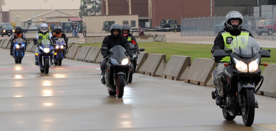 Motorcyclists drive on the flight line on Barksdale Air Force Base, La., Nov. 15, 2013. More than 30 riders participated in the annual Cajun Rumble which involved a safety briefing, a group photo, a two-hour ride and a bike show. (U.S. Air Force photo/Senior Airman Joseph A. Pagán Jr.)