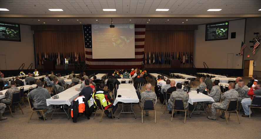 Motorcycle riders listen to a safety briefing at Hoban Hall on Barksdale Air Force Base, La., Nov. 15, 2013. Motorcyclists from the base are required to attend an annual safety briefing to stay up-to-date on the requirements for the Air Force. (U.S. Air Force photo/Senior Airman Joseph A. Pagán Jr.)