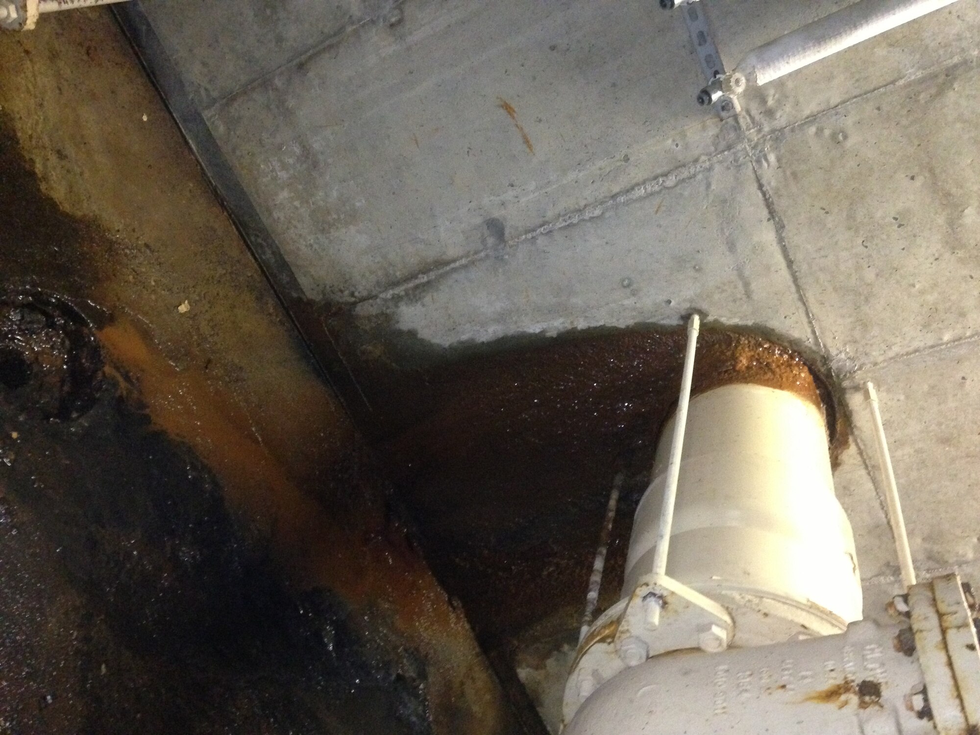 MINOT AIR FORCE BASE, N.D. -- Engineers at the Air Force Civil Engineer Center said this sewage pipe in a lift station here has leaked for several years. It's one of many upgrades and repairs that will be made once the wastewater and water systems are privatized in February 2014. (U.S. Air Force photo/Rick Weston)
