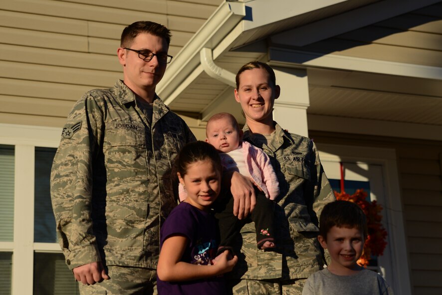 Senior Airman Ryan Jordan, 437th Aircraft Maintenance Squadron electronic warfare technician stands with his wife, Senior Airman Jessica Jordan, 315th Aircraft Maintenance Squadron hydraulic mechanic, 7-year-old daughter Evelyn Hill, and 4-year-old son Cody Hill, and 3-month-old Skyler Jordan Nov. 13, 2013, at Joint Base Charleston – Air Base, S.C. Evelyn was diagnosed with epilepsy in 2010 at the age four. Epilepsy is a brain disorder in which a person has repeated seizures or convulsions. (U.S. Air Force photo/Airman 1st Class Chacarra Neal)