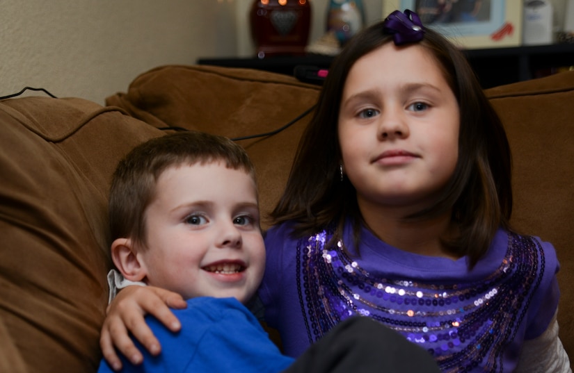 Seven year old Evelyn Hill poses for a photo with her 4-year-old brother Cody Hill Nov. 13, 2013, at Joint Base Charleston – Air Base, S.C. Evelyn was diagnosed with epilepsy in 2010 at the age of 4. Evelyn is the daughter of Senior Airman Jessica Jordan, 315th Aircraft Maintenance Squadron hydraulic mechanic, and Senior Airman Ryan Jordan, 437th Aircraft Maintenance Squadron electronic warfare technician. Epilepsy is a brain disorder in which a person has repeated seizures or convulsions. (U.S. Air Force photo/ Airman 1st Class Chacarra Neal) 