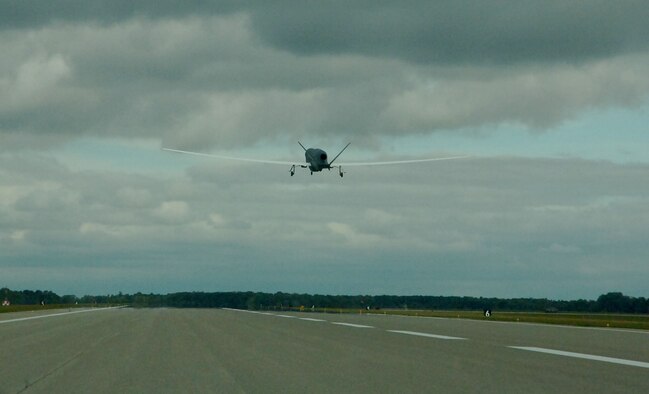 An RQ-Block 40 Global Hawk operated by the 69th Reconnaissance Group takes off from Grand Forks Air Force Base, N.D., Sept. 19, 2013.The historic flight marked the first time the Block 40 deployed to war. (U.S. Air Force photo/Staff Sgt. Luis Loza Gutierrez)
