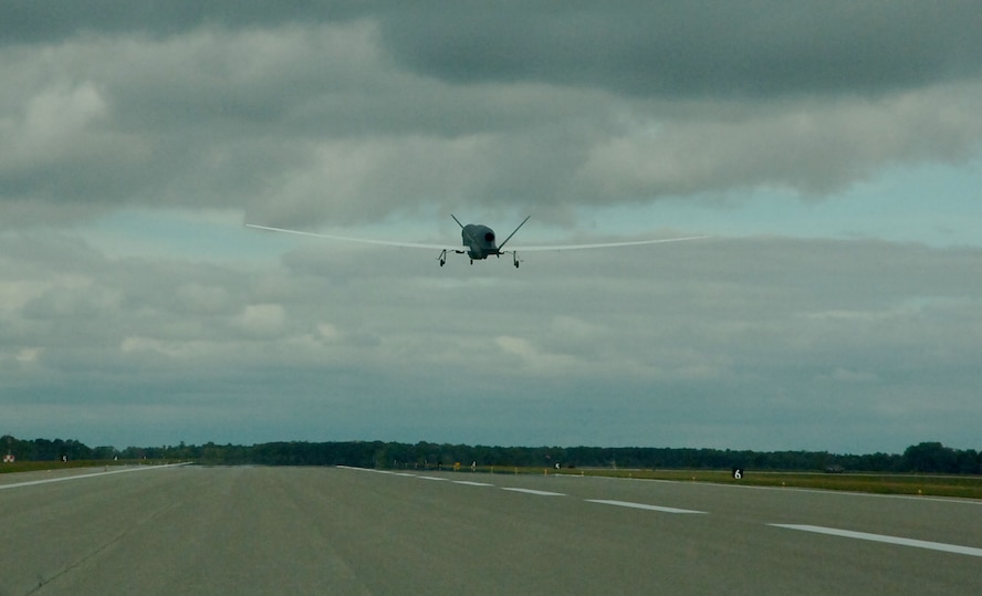 An RQ-Block 40 Global Hawk operated by the 69th Reconnaissance Group takes off from Grand Forks Air Force Base, N.D., Sept. 19, 2013.The historic flight marked the first time the Block 40 deployed to war. (U.S. Air Force photo/Staff Sgt. Luis Loza Gutierrez) (This image was cropped to focus on the subject)