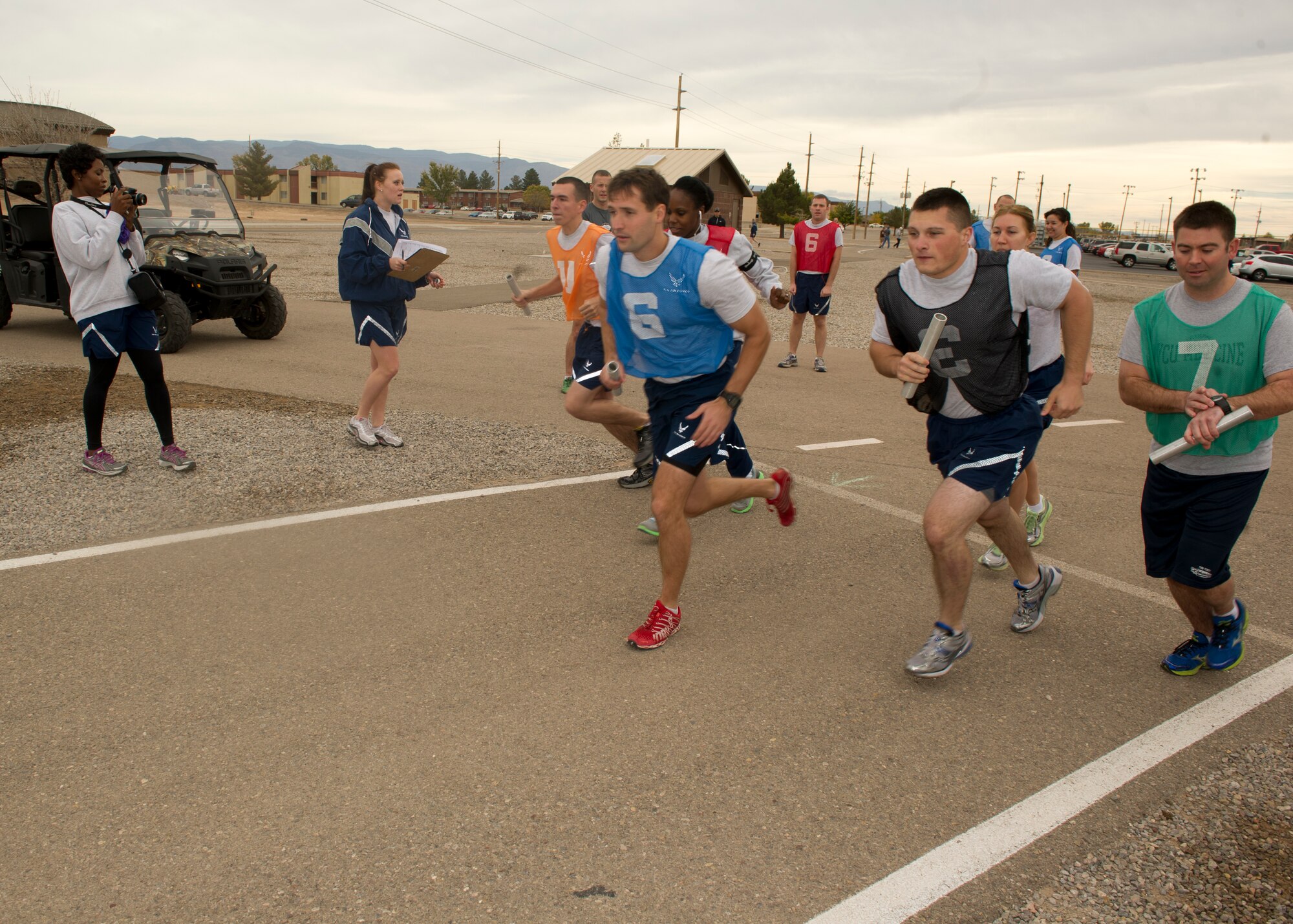 Members of Team Holloman take their first steps in the three-mile relay race during Sports Day event Holloman Air Force Base N.M., Nov. 15. Sports Day is an annual event held through the Domenici Fitness and Sports Center, in which Holloman units compete against one another in various team and individual events. (U.S. Air Force photo by Airman 1st Class Chase Cannon/Released)