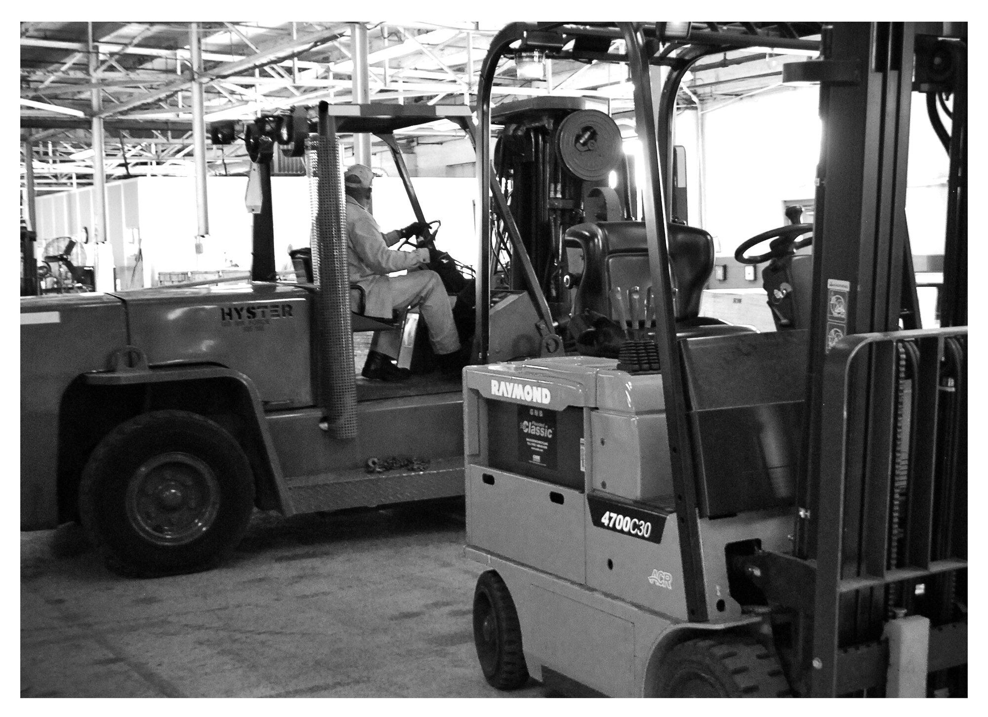 A Bering Straits Logistics Services employee operates a fork lift Oct. 24 at Tyndall. The 325th Logistics Readiness Squadron is slated to stand up April 1, 2014, and will commence full logistics operations by Oct. 1, 2014. (U.S. Air Force photo illustration by 2nd Lieutenant Christopher Bowyer-Meeder)