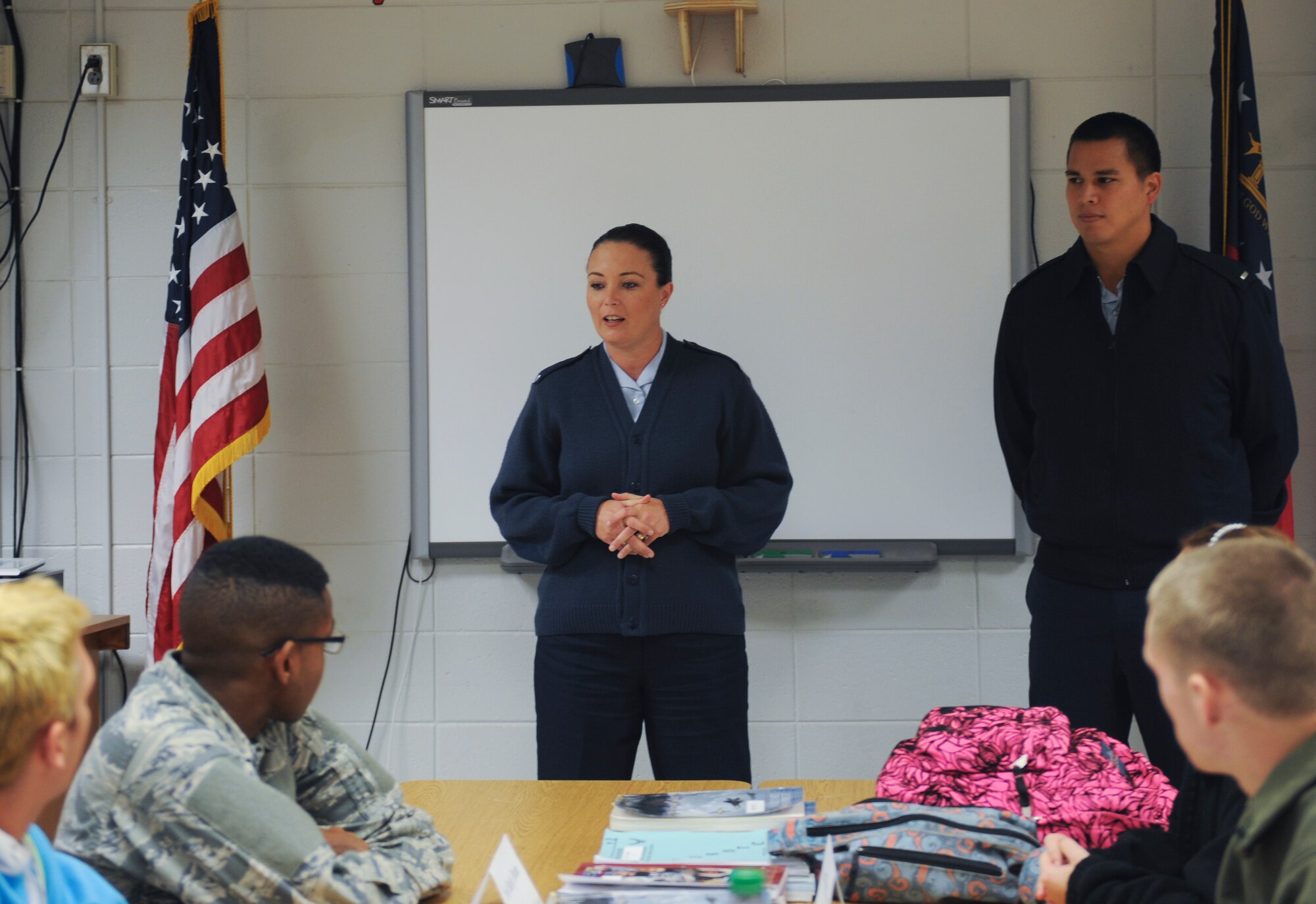 U.S. Air Force Staff Sgt. Regina Cooper, 336th Recruiting Squadron enlisted accessions recruiter, introduces herself to Junior ROTC students at Lowndes High School in Valdosta, Ga., Nov. 13, 2013. Cooper told the students her background and experience in the Air Force before opening the floor up for questions. (U.S. Air Force photo by Senior Airman Olivia Bumpers/Released)