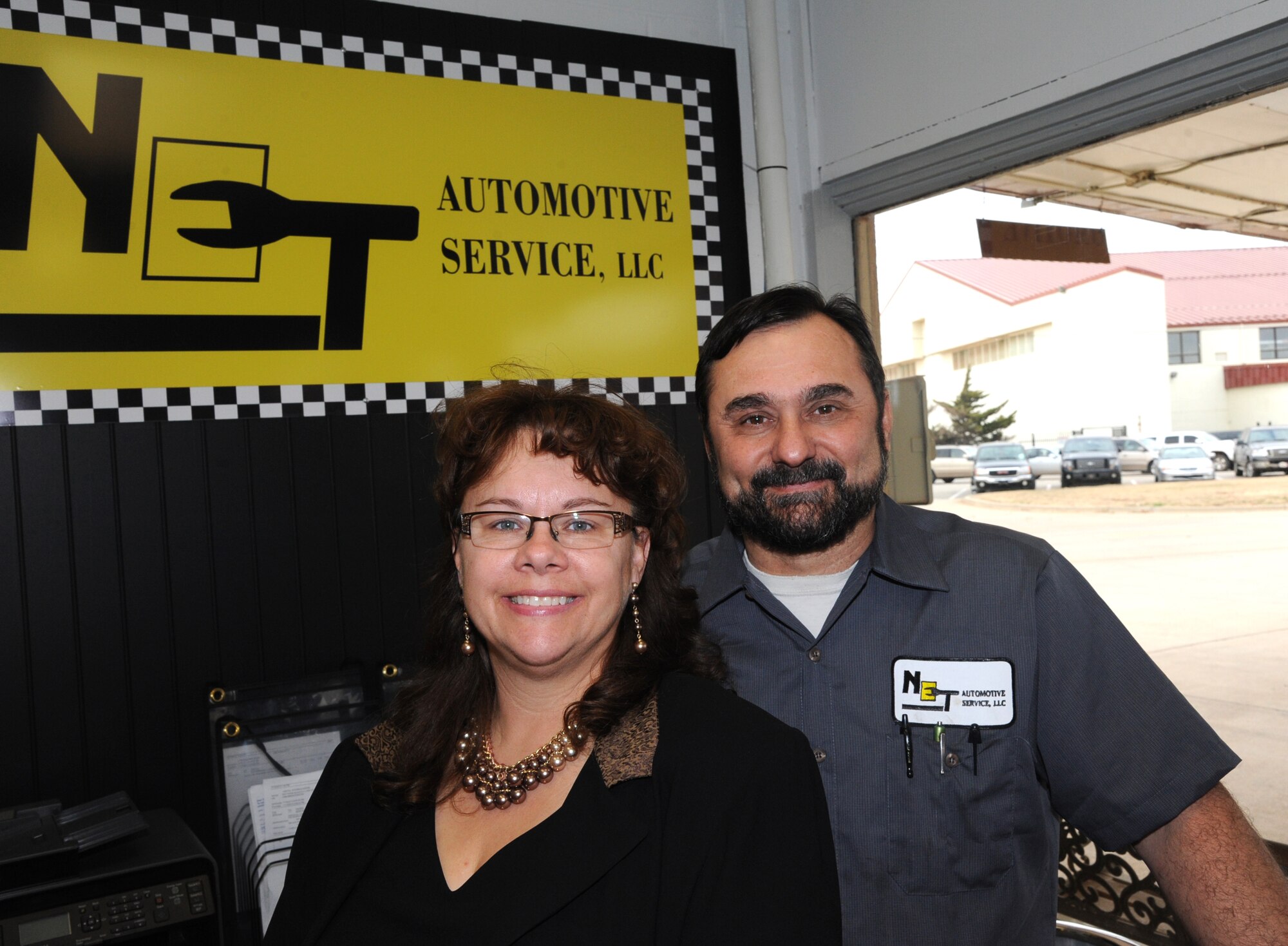 Tony and Sonya Johnson are the co-owners of Net Automotive Service Center in the Army and Air Force Exchange Service gas station on base. Tony is an Automotive Service Excellent certified master auto technician with L1 Advanced Engine Diagnostic certificate and more than 30 years of experience. (U.S. Air Force photo/ Senior Airman Frank Casciotta)