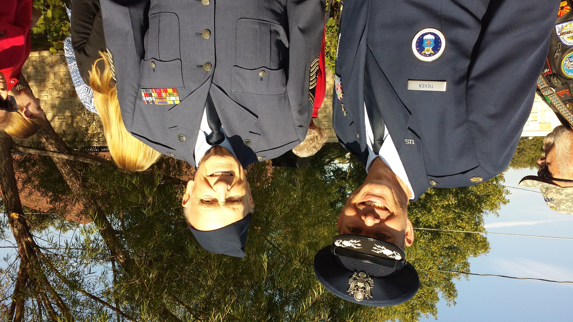 Maj. John Tieken, 344th Recruiting Squadron operations flight commander, visits with a retired chief master sergeant at the Veterans Day Ceremony Nov. 11 in North Richland Hills, Texas. Tieken was the guest speaker at the event, attended by approximately 200 city officials and veterans. (U.S. Air Force photo)