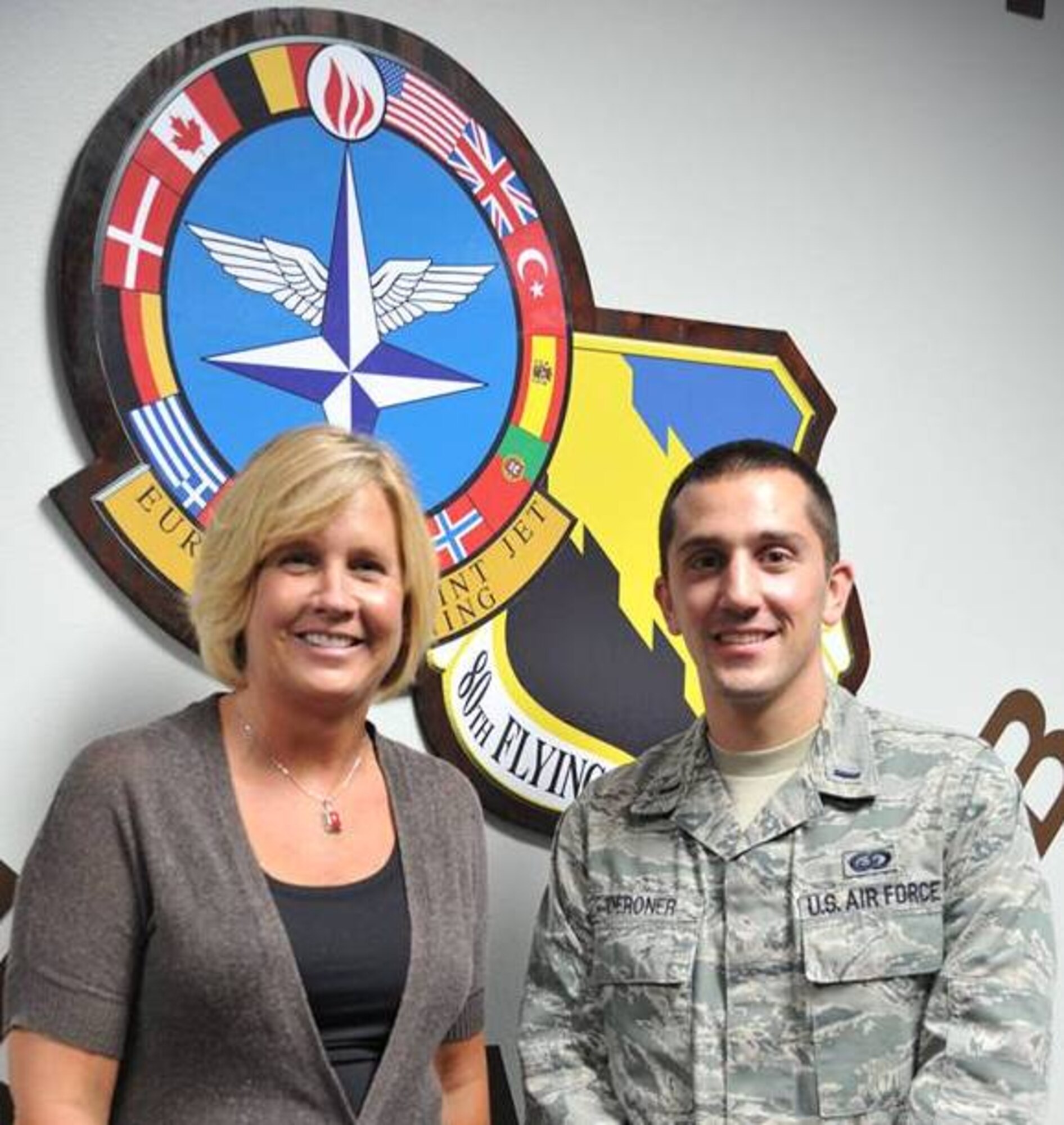80th Flying Training Wing Chief of Protocol Michelle Houck (left) and 1st Lt. Kyle DeRoner were named Air Education and Training Command's top protocol office after being named winners of the 2013 George Washington Award for Protocol Excellence.  The protocol section provided exceptional support to the Euro-NATO Joint Jet Pilot Training Program, the world's only multi-nationally manned flying training program in earning the award.  


