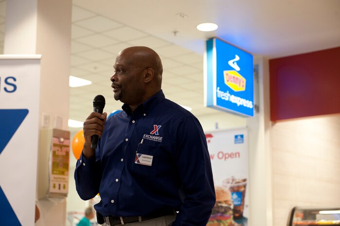 Lawrence Simmons, the Exchange general manager, speaks in front of the Denny’s at the Base Exchange Nov. 19, 2013, at Nellis Air Force Base, Nev. The Denny’s Fresh Express is the newest addition to the Exchange food court and is the first Denny’s in the entire Army and Air Force Exchange Service. (U.S. Air Force photo by Airman 1st Class Thomas Spangler)