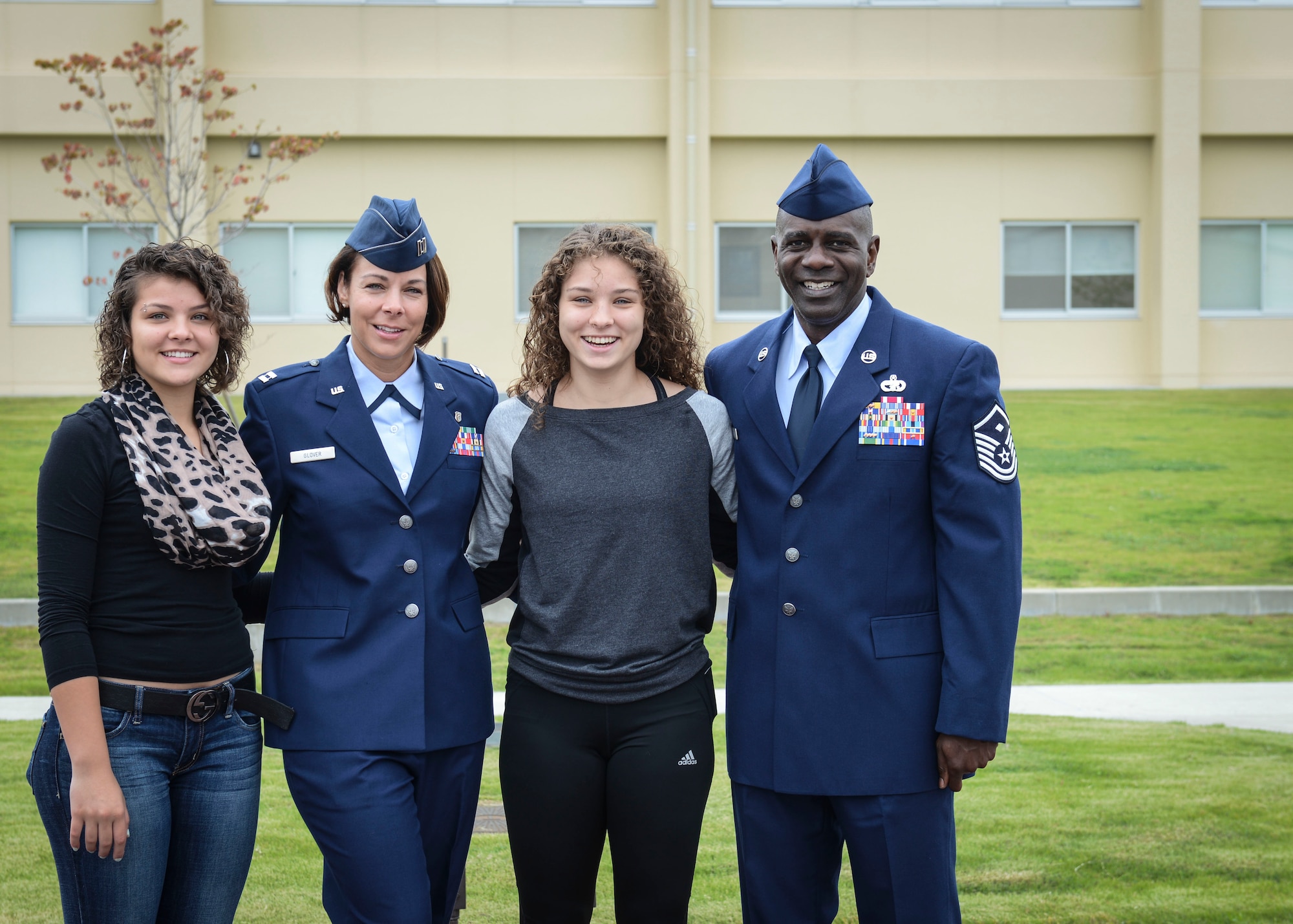 From left are Gianna Glover, Capt. Karina Glover, Sydney Glover and Master Sgt. Jeffrey Glover.  Sydney departed for Basic Military Training Oct. 15 and will be in the Operations Intelligence career field. Her mother administered the oath with her father and sister present. (U.S. Air Force photo/Airman 1st Class Meagan Schutter) 