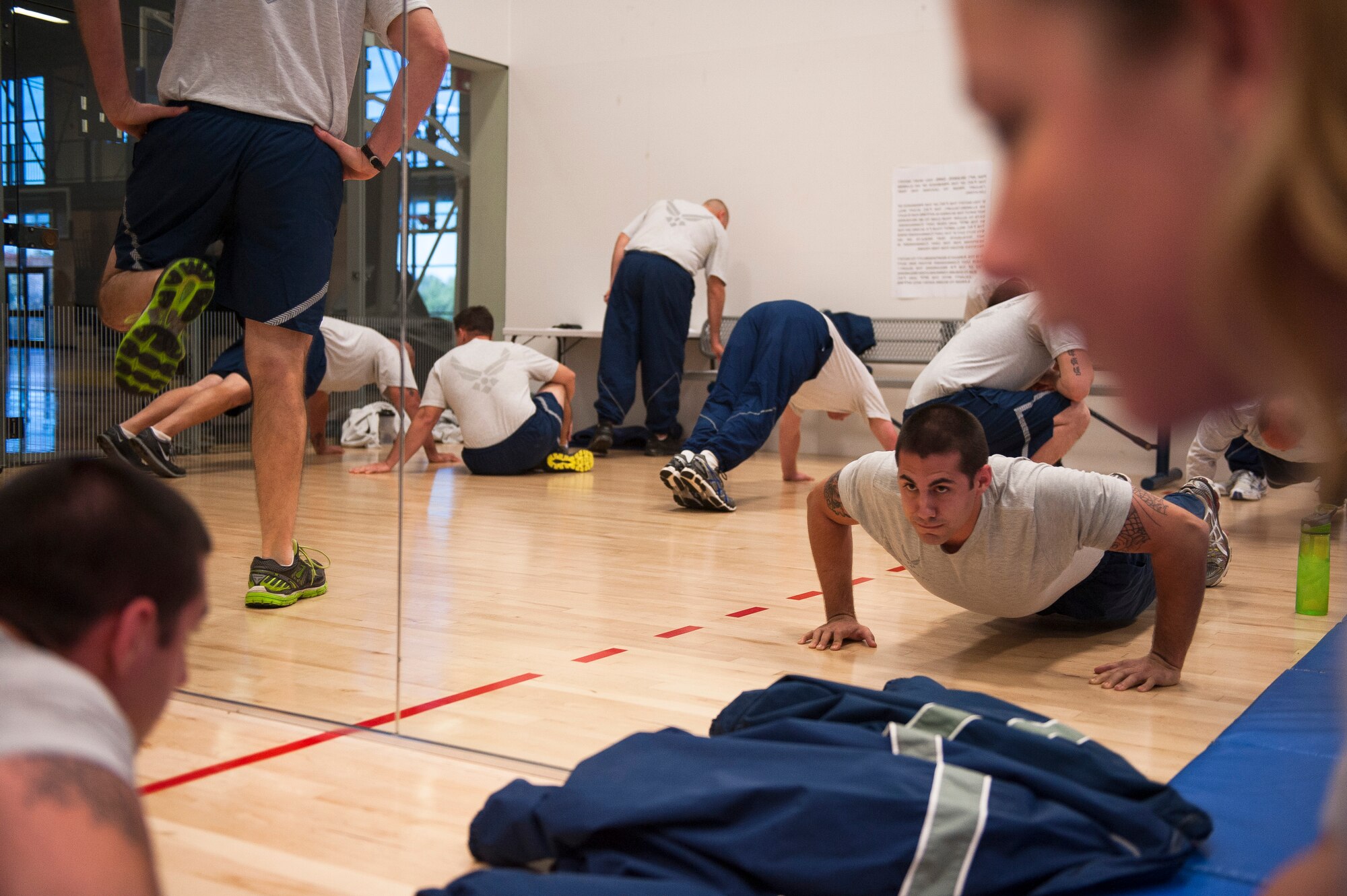 Staff Sgt. Matthew Schmidt, a 19th Aircraft Maintenance Squadron crew chief, completes pushups during his physical fitness test Nov. 7, 2013, at Little Rock Air Force Base, Ark. All members of the Air Force must be physically fit to support mission requirements. (U.S. Air Force photo by Staff Sgt. Russ Scalf)