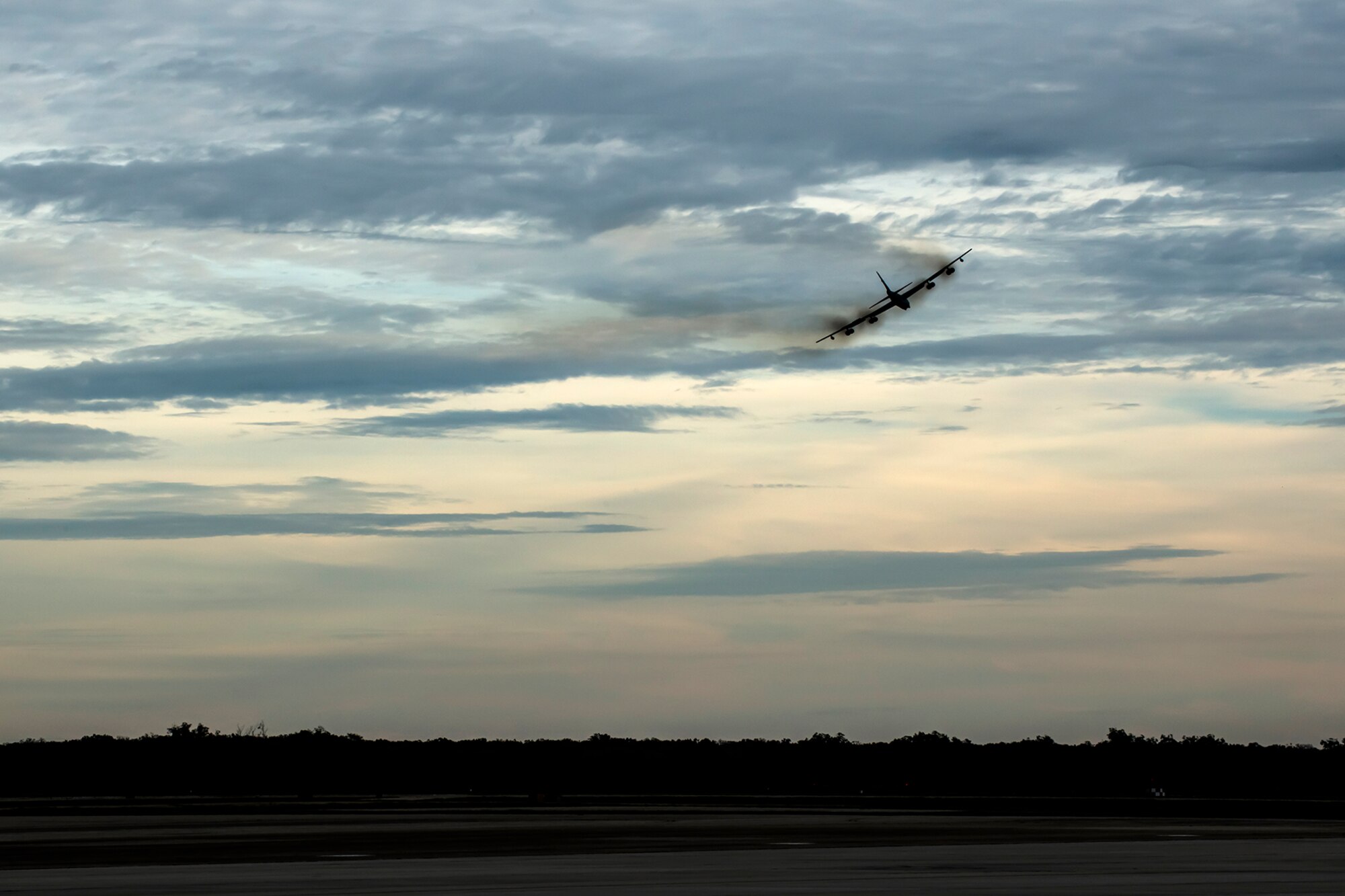 A B-52H Stratofortress assigned to the 93rd Bomb Squadron (BS), 307th Bomb Wing, turns before making a final approach for landing at Barksdale Air Force Base, La., Nov. 8, 2013. In 2010, the 93rd BS made history by sending a B-52 to participate in the NATO Days in Ostrava air show, which marked the first landing of a B-52 in the Czech Republic. (U.S. Force photo by Master Sgt. Greg Steele/Released)