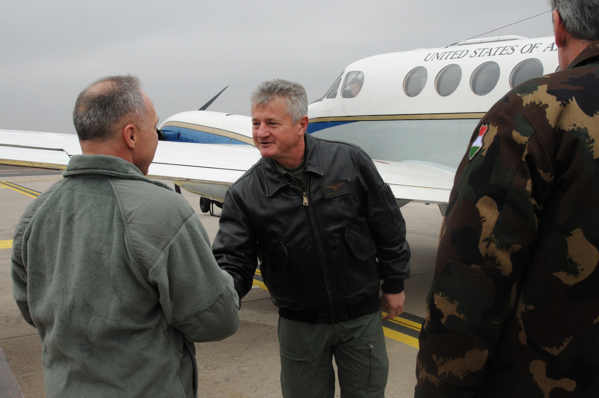 Col. Allen Hebert, 86th Dental Squadron commander, greets Brig. Gen. Albert Safar, air chief of Hungarian Defense Forces, at the distinguished visitor ramp here Nov. 18, 2013. Safar visited Ramstein for the day and met with Gen. Frank Gorenc, U.S. Air Forces in Europe and Air Forces Africa commander and Lt. Gen. Dominique de Longvilliers, deputy commander for Headquaters Allied Air Command. (U.S. Air Force Photo by Tech. Sgt. James M. Hodgman)