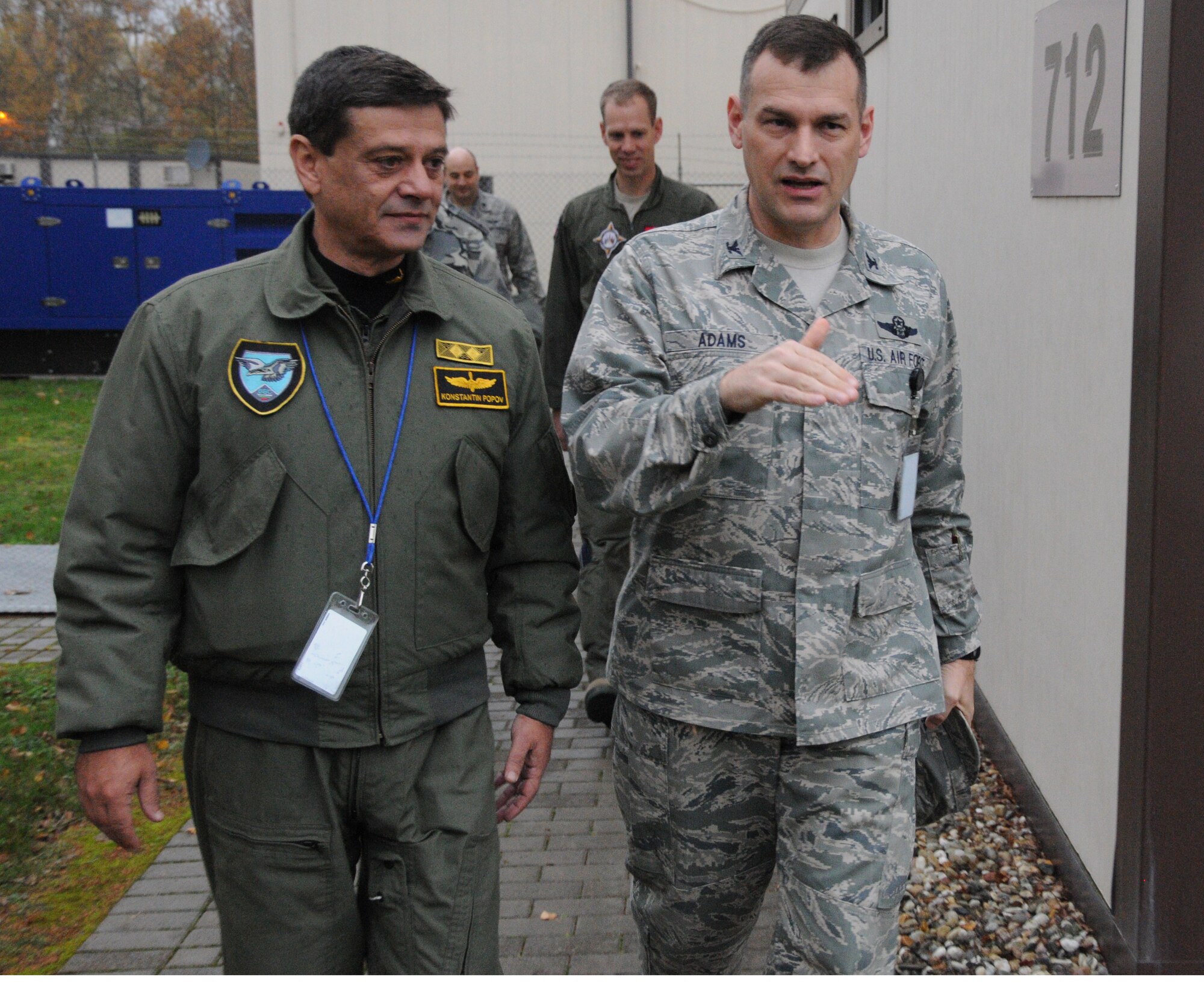 Col. Cloyce Adams (Right), Warrior Preparation Center commander, escorts Maj. Gen. Constantin Popov, commander Bulgarian air force, through the WPC compound during a site visit Nov. 19, 2013. Popov visited the WPC to learn about the ballistic missile defense mission. (U.S. Air Force photo by Tech. Sgt. James M. Hodgman) 