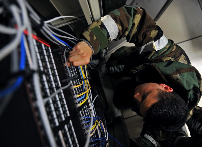 Staff Sgt. Michael Deaton, 51st Communications Squadron cyber systems operations technician, trouble shoots a server at Osan Air Base, Republic of Korea, Nov. 20, 2013. The 51st CS ensures that all of Osan’s communications assets are operable and performing as optimally as possible. (U.S. Air Force photo/Senior Airman Siuta B. Ika)