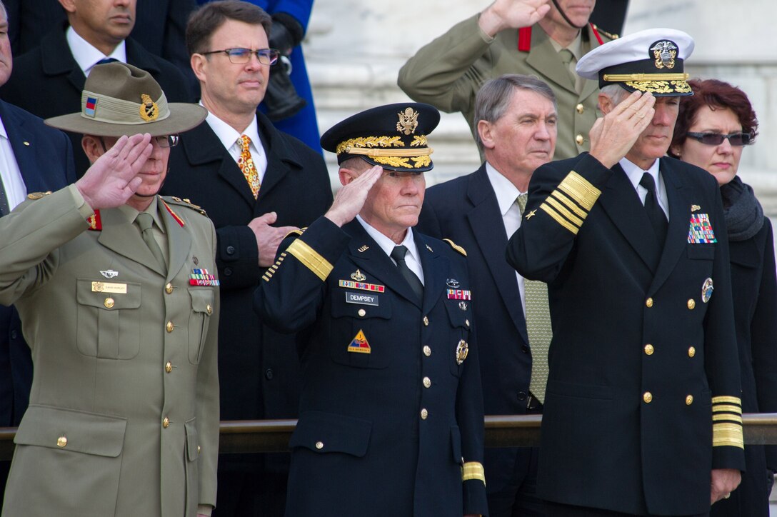 Australian Defense Force Chief Gen. David Hurley, left, U.S. Army Gen. Martin E. Dempsey, center, chairman of the Joint Chiefs of Staff, and U.S. Navy Adm. Samuel J. Locklear III, commander of U.S. Pacific Command, salute during a wreath-laying ceremony at the Tomb of the Unknown Soldier in Arlington National Cemetery, Va., Nov. 20, 2013.