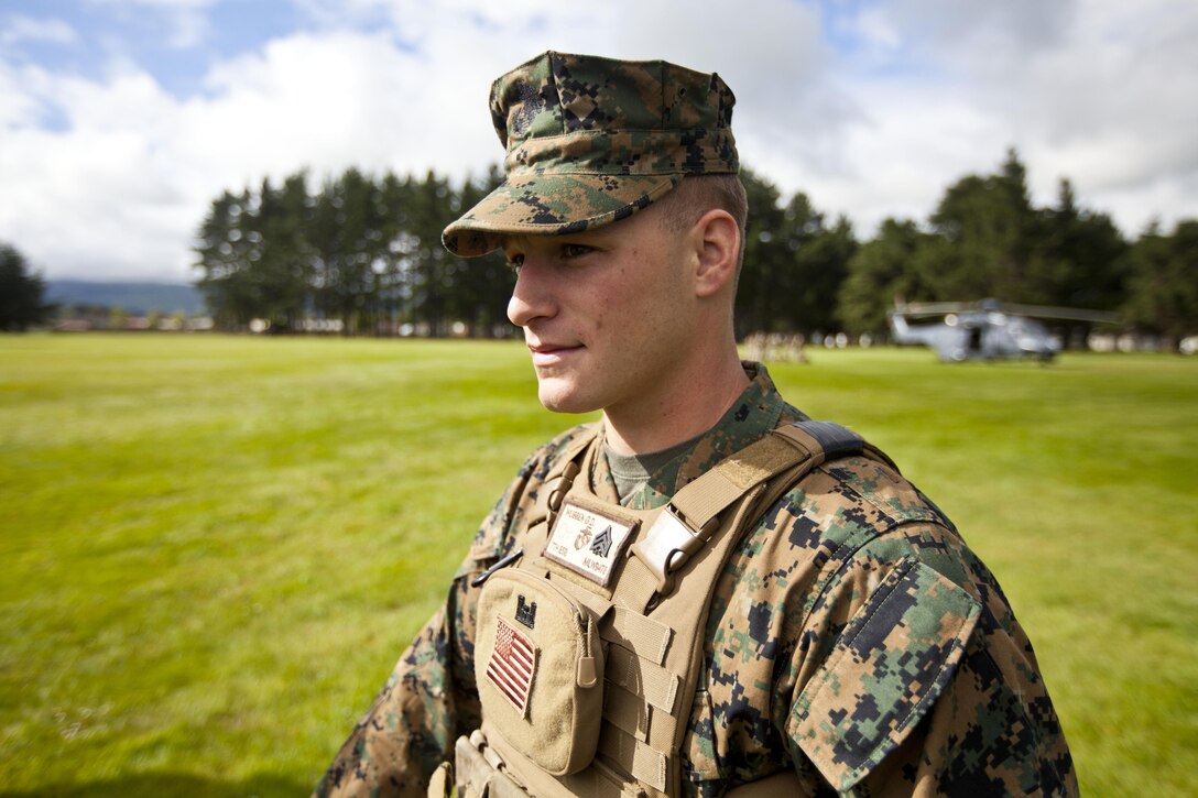 Sgt. Greg Wubben, a civil affairs non-commissioned officer with 1st Civil Affairs Group, I Marine Expeditionary Force, from Ridgefield, Wash., waits for a familiarization brief on New Zealand helicopters during the initial stages of exercise Southern Katipo 2013 aboard Linton Military Camp, New Zealand, Nov. 4. SK13 is designed to improve participating forces’ combat training, readiness and interoperability as part of a Joint Inter-Agency Task Force.