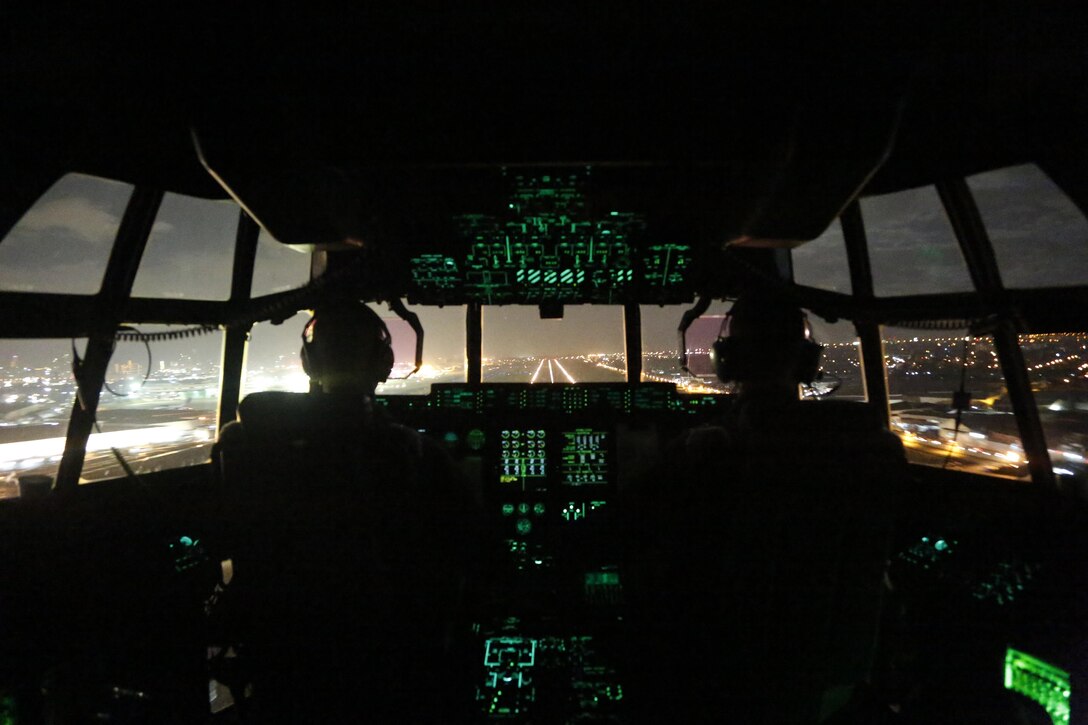 U.S. Marine Corps Lt. Col. Jason Julian (left), commanding officer of Marine Aerial Refueler Transport Squadron 152 (VMGR-152), Marine Aircraft Group 36 (MAG-36), 1st Marine  Aircraft Wing (1st MAW) and Capt. Graham Castromiller, copilot Villamor Airbase,  the Republic of the Philippines, Nov. 18, 2013. The VMGR-152 provided continuous  missions around the clock  to relief effort in support of Ouate survivors affected by Typhoons Haiyan and Yolanda in support  of the disaster relief Operation Damayan. (U.S. Marine Corps photo by Lance Cpl. Luis A. Rodriguez III/ Released)
