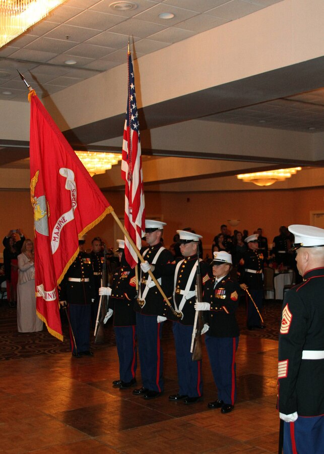 Marines with Recruiting Station Jacksonville lower the Marine Corps Flag
during the play of the National Anthem part of the the 238th Marine Corps
Birthday Ball ceremony at Wyndham Jacksonville Riverwalk hotel Nov. 16,
2013.
