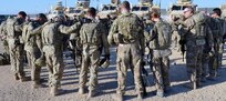 Soldiers with Task Force Centurion Prime's HHC and C Company pray together before heading out on a mission recently in Jalalabad, Afghanistan. (Courtesy photo) 