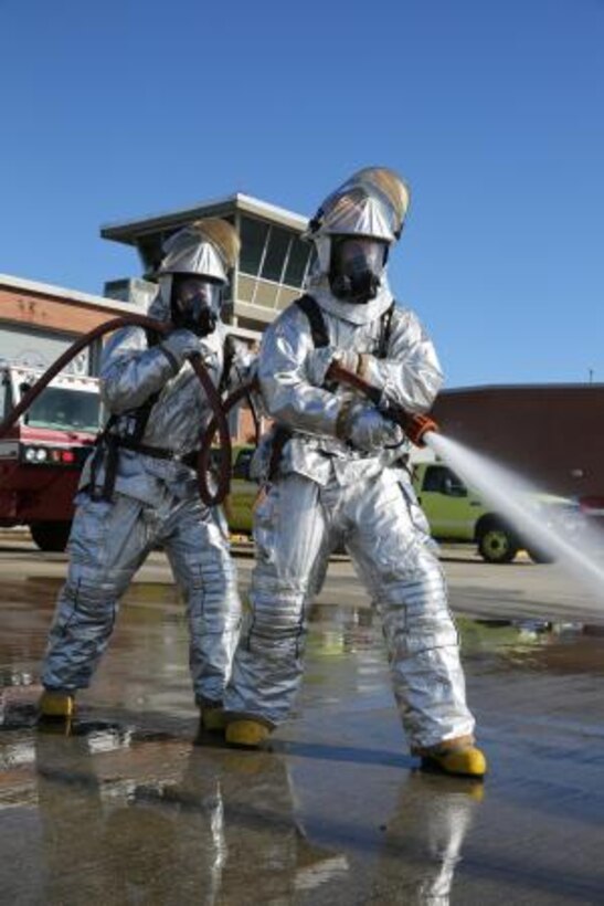 Pfc. Elliott L. Vickers trains on the hose of their emergency vehicle Nov. 19 at Marine Corps Air Station Cherry Point. Vickers is aircraft rescue and firefighting specialist with Marine Wing Support Squadron 272.




