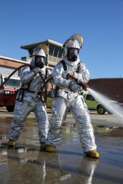 Pfc. Elliott L. Vickers trains on the hose of their emergency vehicle Nov. 19 at Marine Corps Air Station Cherry Point. Vickers is aircraft rescue and firefighting specialist with Marine Wing Support Squadron 272.