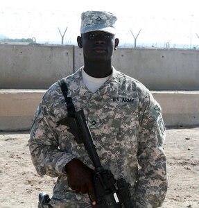 Pfc. Ismaila Pam, of Louisville, discusses his ties to Africa while on a mission there.