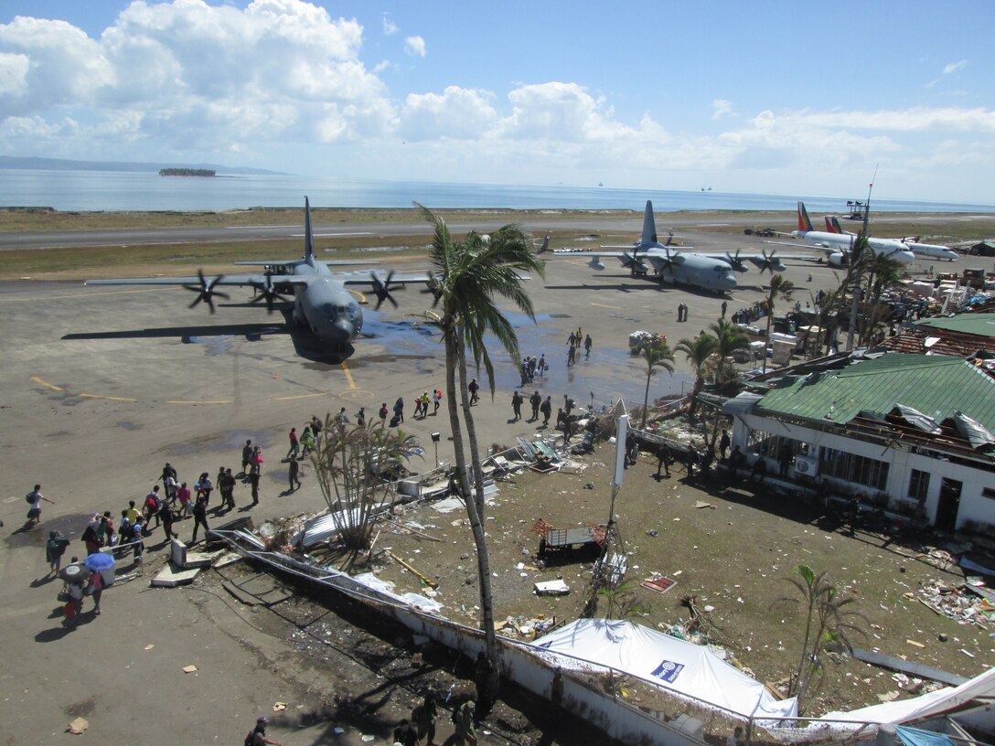 Survivors of Typhoon Haiyan prepare to board Australian and U.S. C-130 Super Hercules aircraft, Nov. 18, as part of Operation Damayan. The U.S. aircraft are assigned to 3rd Marine Expeditionary Brigade, part of Joint Task Force-505, operating in support of the Government of the Philippines, in coordination with the U.S. Agency for International Development.
