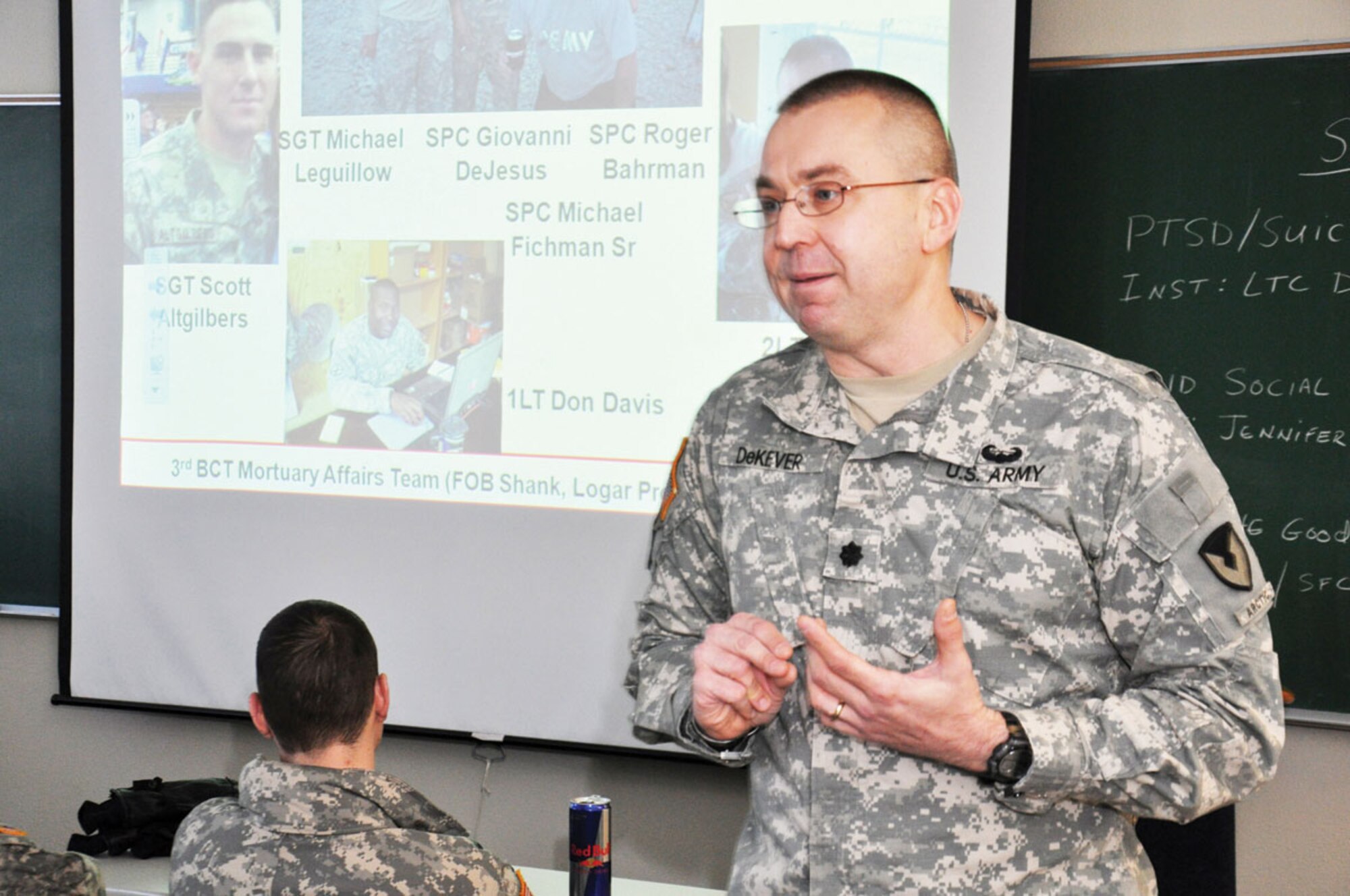 Army Lt. Col. Andrew DeKever speaks to U.S. Army Alaska Soldiers during a Ready and Resilient Campaign briefing about suicide and PTSD. DeKever served as a mortuary affairs officer in Afghanistan several years ago and for a time had difficulty dealing with combat stress. (U.S. Air Force photo/Jim Hart)

