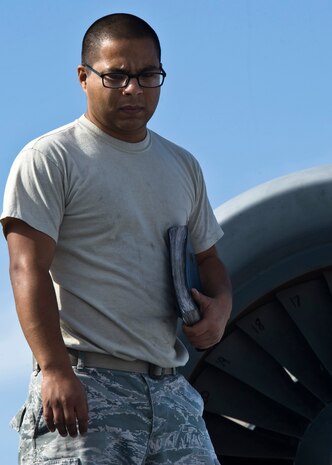 U.S. Air Force Staff Sgt. Jose Grijalva, 757th Aircraft Maintenance Squadron aerospace propulsion technician, conducts pre-flight checks on an A-10 Thunderbolt II Nov. 18, 2013, at Nellis Air Force Base, Nev. The A-10 Thunderbolt II is designed for close air support of ground forces. (U.S. Air Force photo by Airman 1st Class Jason Couillard)