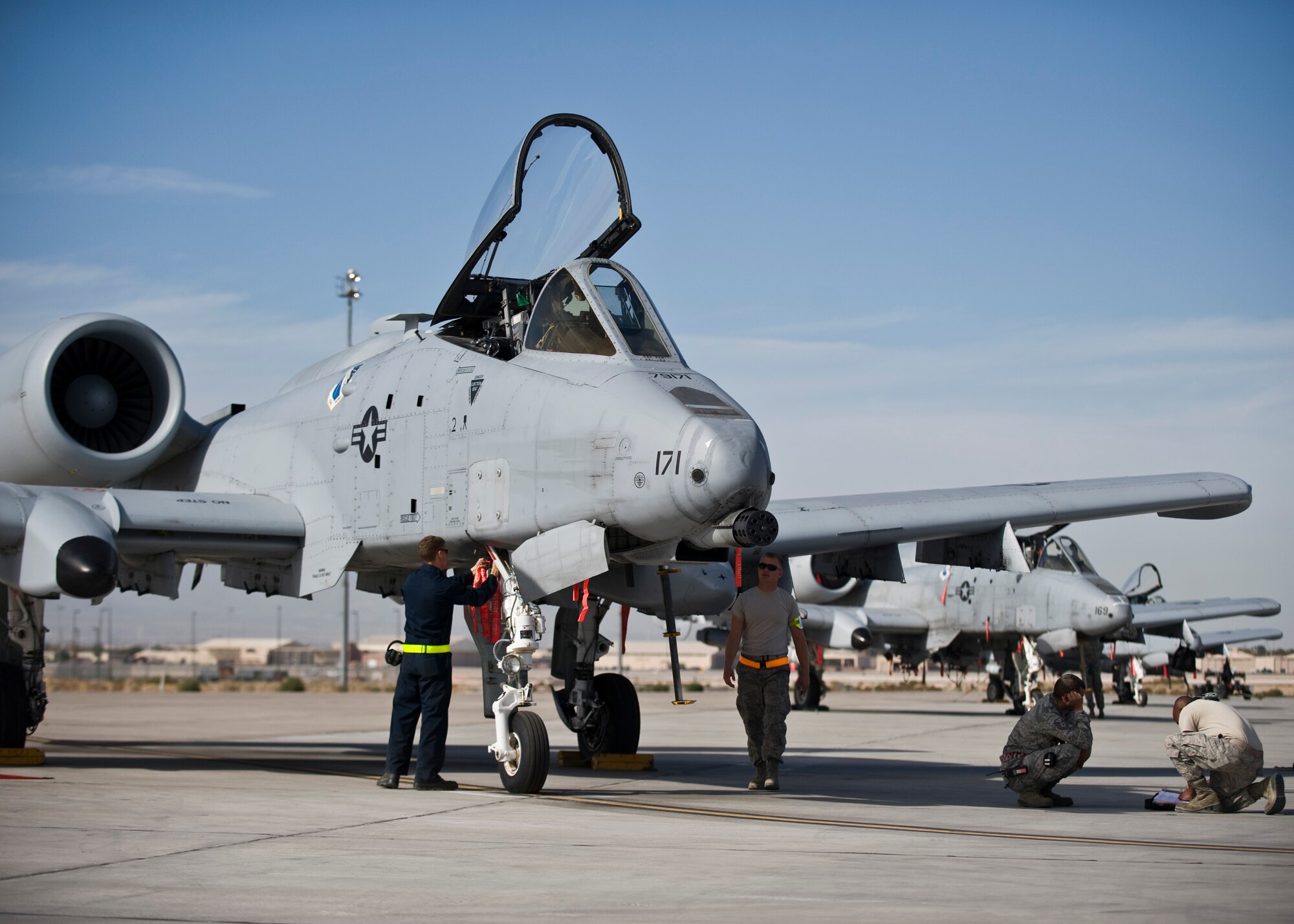 U.S. Air Force Airmen from the 757th Aircraft Maintenance Squadron prepare for pre-flight checks Nov. 18, 2013, at Nellis Air Force Base, Nev. The 757th AMXS accomplishes intermediate-level maintenance on aircraft and support equipment components, maintains avionics, laser guided weapons systems, pneudraulics, fuel systems, engines, measurement and diagnostic equipment, electro-environmental and egress systems. (U.S. Air Force photo by Airman 1st Class Jason Couillard)